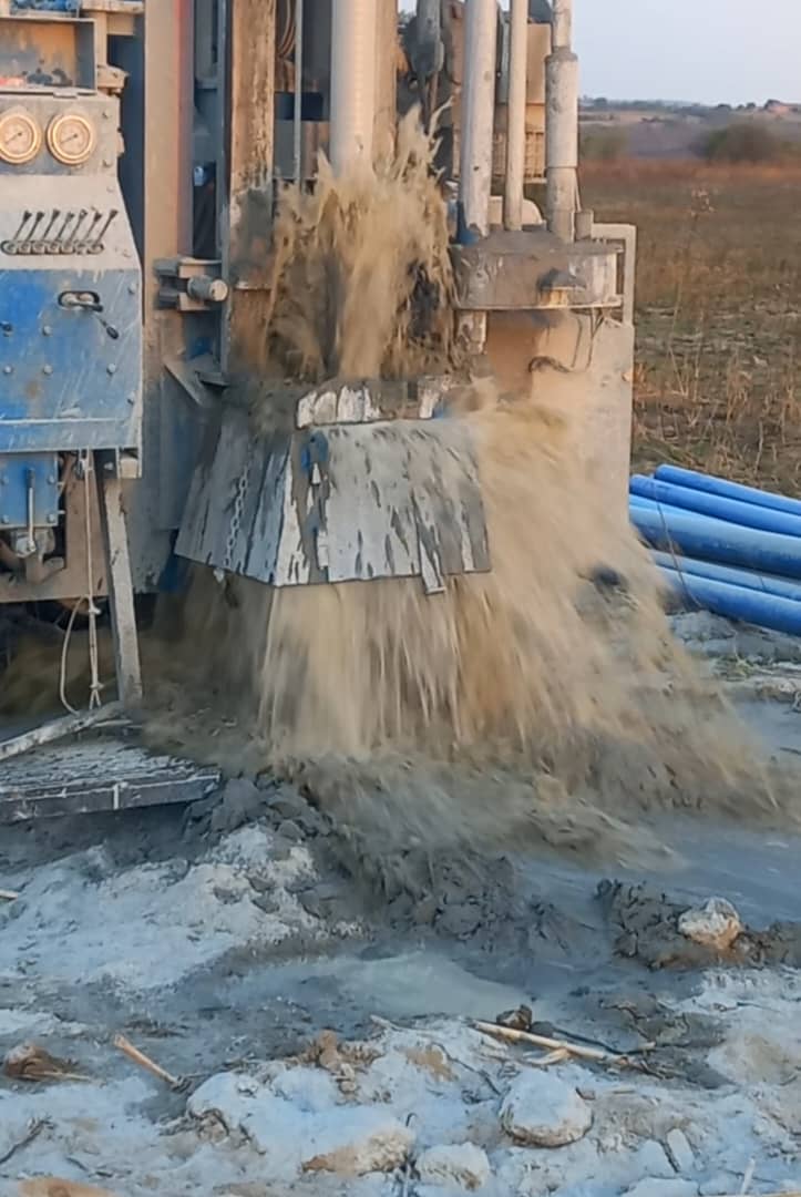 Water gushing from borehole